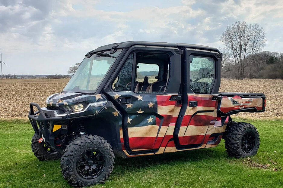 Just Fab Graphics created patriotic graphics to wrap a utility vehicle and produced the wrap on its Roland DG TrueVIS VG2-540 digital printer/cutter.