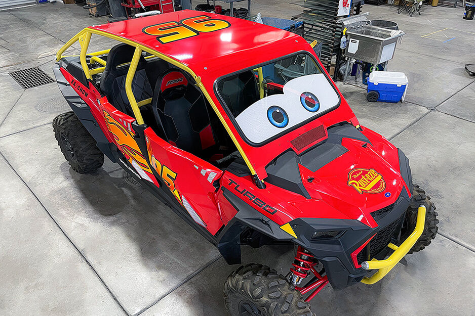 Fun wraps like this Lightning McQueen-themed wrap for an off-road vehicle are a specialty at Team Acme.