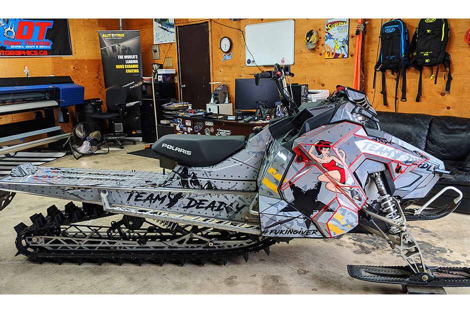Wide Open Throttle Graphics produces unique and colorful snowmobile wraps on its Roland DG TrueVIS VG2-540 digital printer/cutter.