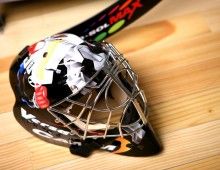 hockey stick and goalie mask