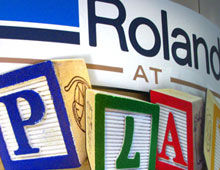 sectional sign Roland At Play
